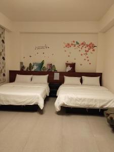 Letto o letti in una camera di Ke Lai Inn B&B