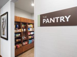 a pantry with a sign that reads the pantry at Staybridge Suites Midvale, an IHG Hotel in Midvale