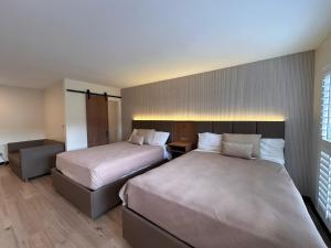 Katil atau katil-katil dalam bilik di Bevonshire Lodge Motel
