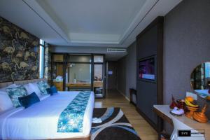 Sayarsan Hotel Yangon客房内的一张或多张床位
