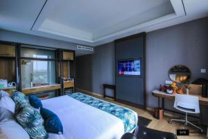 Sayarsan Hotel Yangon客房内的一张或多张床位
