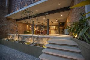 a staircase leading to a building with a lobby at Ella Heritage in Ella