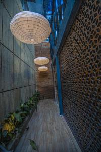 a hallway with two large lights on the side of a building at Ella Heritage in Ella +46 photos