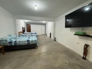 TV a/nebo společenská místnost v ubytování La casita del naufrago