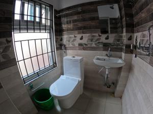 Vannituba majutusasutuses Hotel Global Village