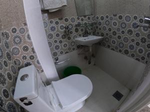 Vannituba majutusasutuses Hotel Global Village