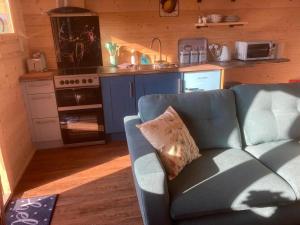 Un lugar para sentarse en Captivating 1-Bed Lodge in Chesterfield