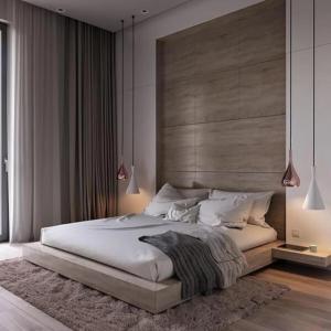 sypialnia z dużym łóżkiem z drewnianym zagłówkiem w obiekcie 悅柏行旅 逢甲館 YABO Inn w mieście Taizhong
