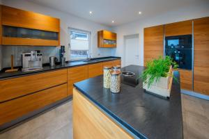 Kuchyň nebo kuchyňský kout v ubytování Ferienhaus Escherich