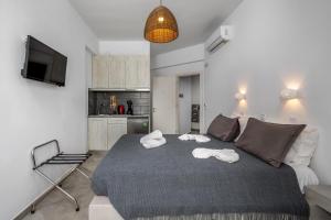 Postel nebo postele na pokoji v ubytování MaMas Oloessa Studio