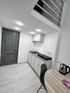 Kuchyň nebo kuchyňský kout v ubytování Mandarin Hotel + 18 fotografií