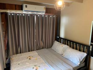 Postel nebo postele na pokoji v ubytování Kid & Aln Home Sweet Home