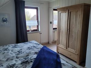 Postel nebo postele na pokoji v ubytování Wohnung mit Wintergarten