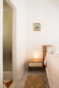 Postel nebo postele na pokoji v ubytování Villa Ruza