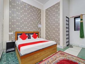 En eller flere senger på et rom på OYO Flagship 81060 Hotel Rudra