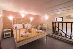 a bedroom with two bunk beds in a room at Xenios Zeus Maisonettes Old Town Rhodes in Rhodes Town