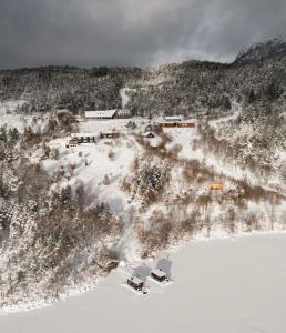 an aerial view of a ski resort in the snow at Preikestolen BaseCamp in Jørpeland