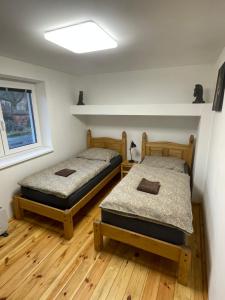 Postel nebo postele na pokoji v ubytování Apartmány MonTexas