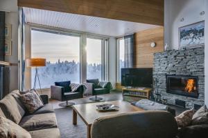 Et opholdsområde på Rukavuorenhuippu Apartment