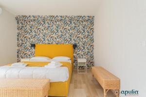 Postel nebo postele na pokoji v ubytování Einaudi Guesthouse by Apulia Accommodation