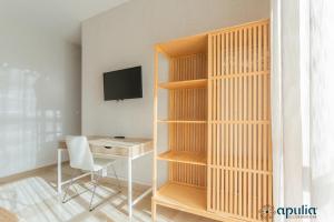 TV a/nebo společenská místnost v ubytování Einaudi Guesthouse by Apulia Accommodation