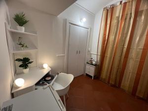 TV a/nebo společenská místnost v ubytování Domus Isidis room
