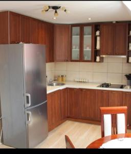 Kuchyň nebo kuchyňský kout v ubytování Apartment Home Popovic + 37 fotografií