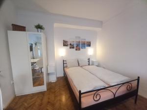 Posteľ alebo postele v izbe v ubytovaní Budapest A+ Apartment