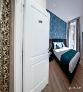 Postel nebo postele na pokoji v ubytování Alba Rosa Rooms