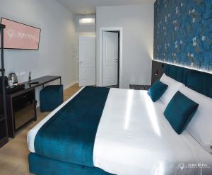 Postel nebo postele na pokoji v ubytování Alba Rosa Rooms