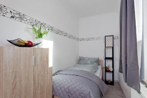 Ein Bett oder Betten in einem Zimmer der Unterkunft Bungalow "Wiesenblick"