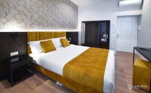 Postel nebo postele na pokoji v ubytování Alba Rosa Rooms