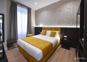 Postel nebo postele na pokoji v ubytování Alba Rosa Rooms