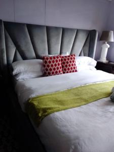 Кровать или кровати в номере norizana's apartment
