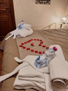 Postel nebo postele na pokoji v ubytování GIRASOLE Wellness e Relax