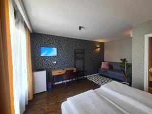 Postel nebo postele na pokoji v ubytování Vila Privilege Felix