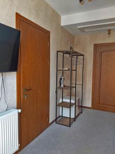 TV a/nebo společenská místnost v ubytování Green Inn Hotel