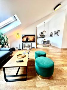 Televízia a/alebo spoločenská miestnosť v ubytovaní Aria Suite & SPA Dubrovnik