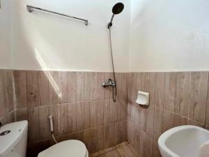 Koupelna v ubytování Brenmariel Tourist Inn