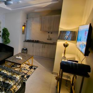 O zonă de relaxare la Luxury Studio Apartment