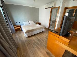Postel nebo postele na pokoji v ubytování Flat REFORMADO em hotel no Jardins