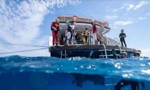 a group of people on a boat in the water at Alam B&B in Marsa Alam City