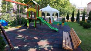 a playground with a slide and a gazebo at Diamond Palace in Sunny Beach