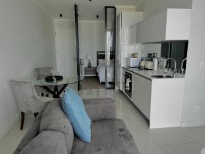 Η κουζίνα ή μικρή κουζίνα στο Xquisite Ellipse Apartment