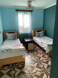 Voodi või voodid majutusasutuse Zangu Hotel toas