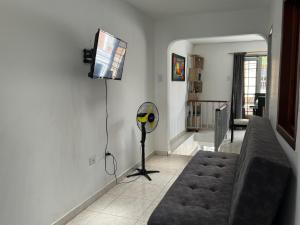 TV a/nebo společenská místnost v ubytování Apartamento bien ubicado central