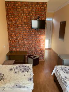 Voodi või voodid majutusasutuse Zangu Hotel toas