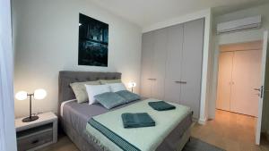 Ένα ή περισσότερα κρεβάτια σε δωμάτιο στο Skala Waterfront - Beograd na vodi