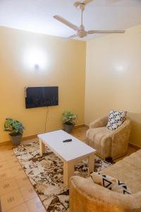 TV a/nebo společenská místnost v ubytování Clarine Cozy Holiday Home + 8 fotografií