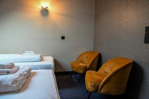 Postel nebo postele na pokoji v ubytování Hotel Oostereiland
